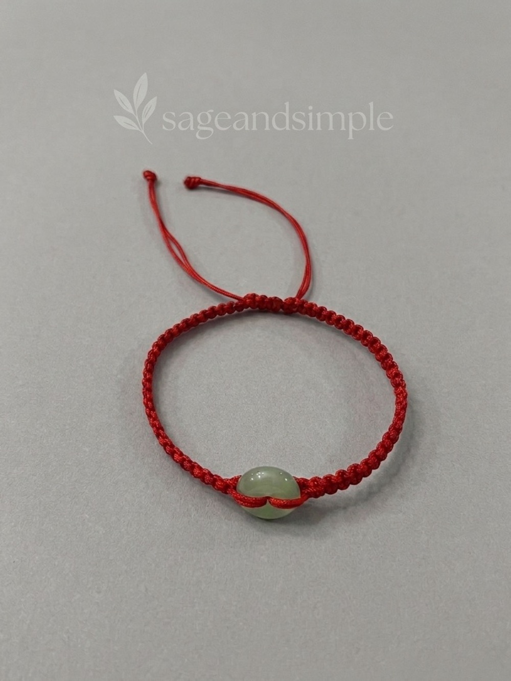 Lucky Red Braided Bracelet with Jade Accent - Bringing Fortune to your Life.